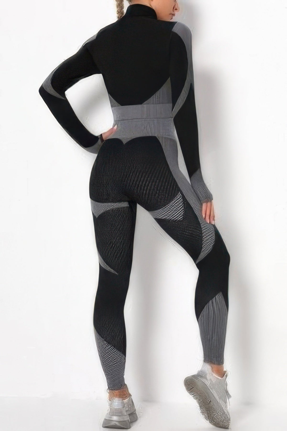 JULIETTA COLLECTION black and grey color block long-sleeve activewear set with high-waisted leggings, back view.