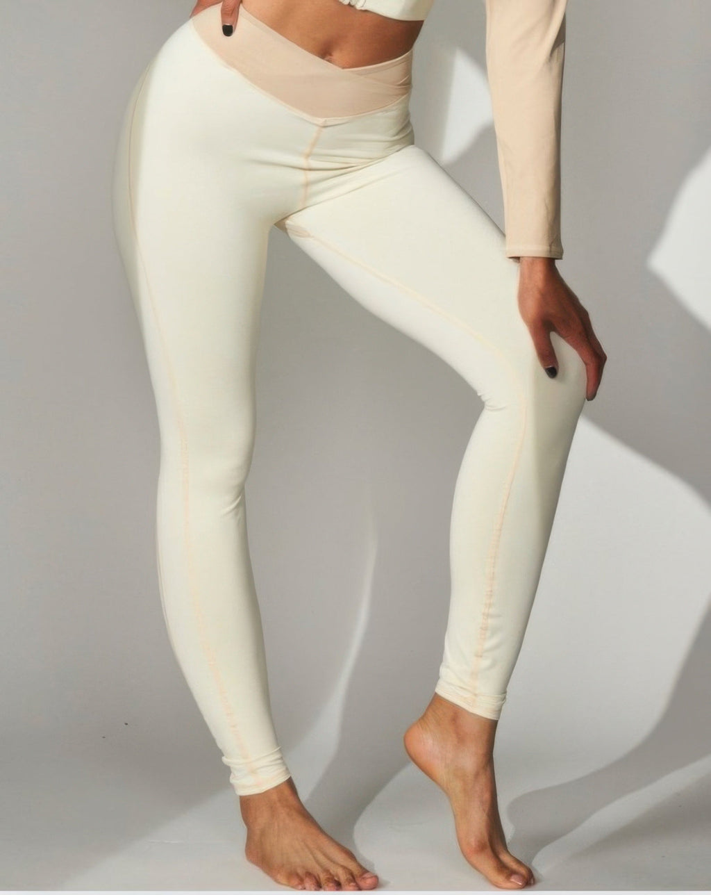 JULIETTA COLLECTION high-waisted cream color block leggings with a sleek skinny fit for yoga and activewear.