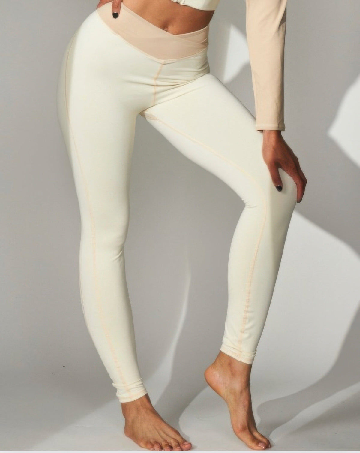 JULIETTA COLLECTION high-waisted cream color block leggings with a sleek skinny fit for yoga and activewear.